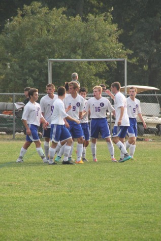 Boys varsity soccer celebrates after scoring their fifth goal against Hanover on Sept. 8th at LHS.