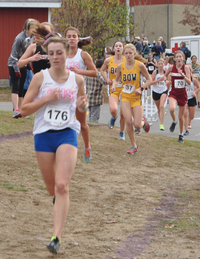 Junior Bella Ziolek and sophomore Alex Seeley lead a pack of runners at the Meet of Champions.