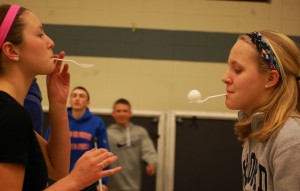 One of the most memorable games of the night was the ping pong relay in which the teams put spoons in their mouths and passed a ping pong ball to each member.