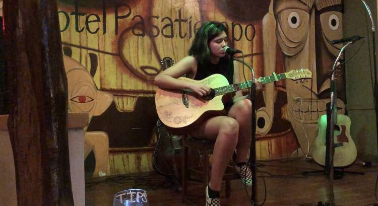 McRitchie performs at the Monkey La-La Bar at Hotel Pasatiempo in Tamarindo, Costa Rica. According to McRitchie, the hotel was “perfect” for her first guitar performance.