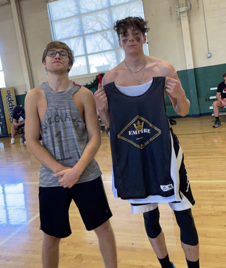 Senior Danny Garrity and junior Sean Clegg swap jerseys after an intense scrimmage.