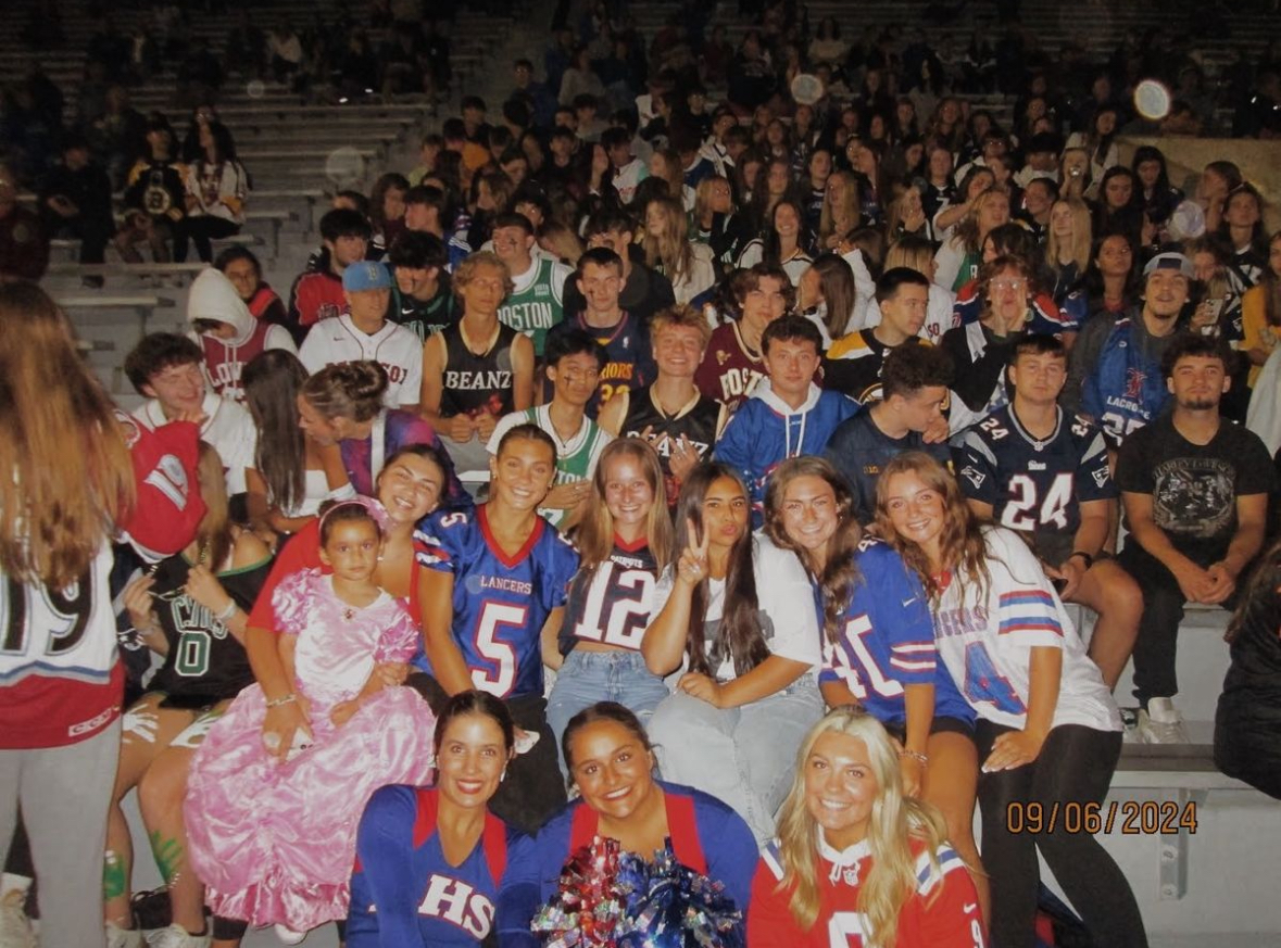 Lancer Nation stands packed, loud and styled on Friday night!