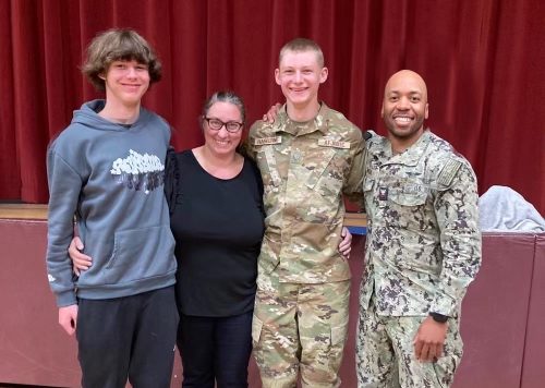 Caleb Haseltine at the ROTC Award Ceremony with brother Justin Haseltine, mother Krystal Pohl, and A02 Brandon McGee