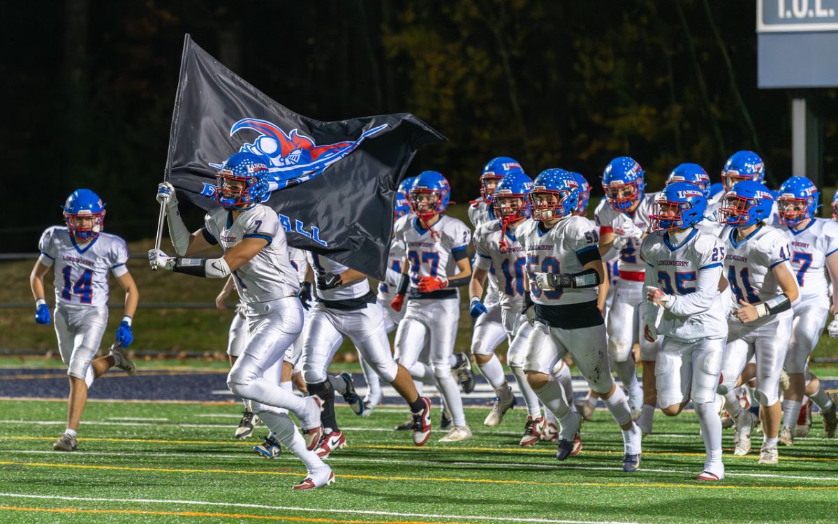 Team running out prior to matchup vs Exeter. (Photo by Charlie Ogden) 