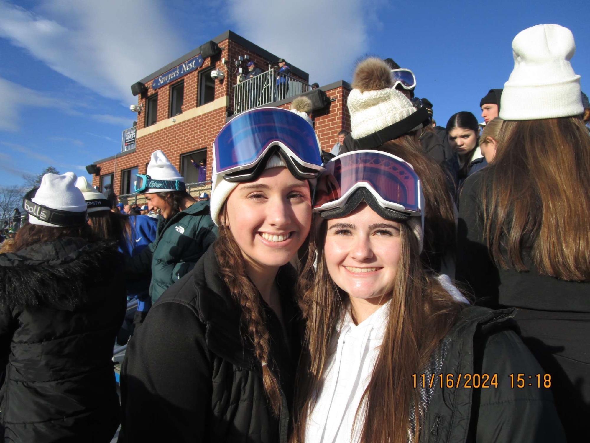 Juniors Jen Raza and Gabby Brunetti show off their spirit in ski attire 