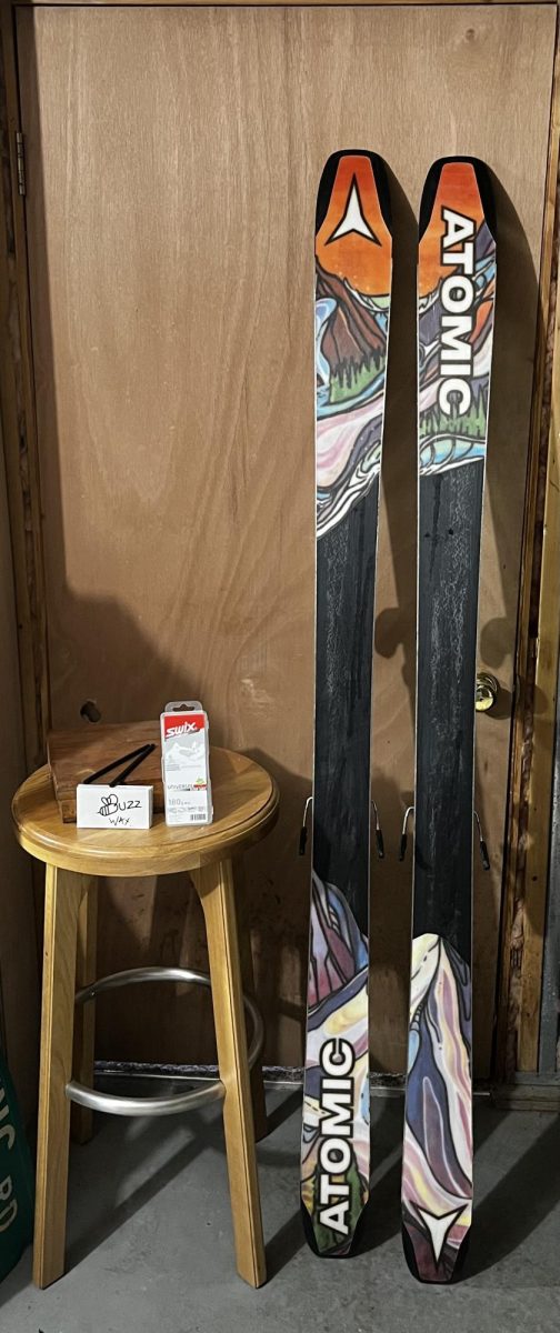 Skis sit beside wax on display ready to be prepared for the season.