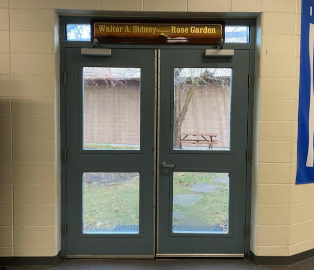 The doors inside of LHS guard the garden from the bustling foyer.