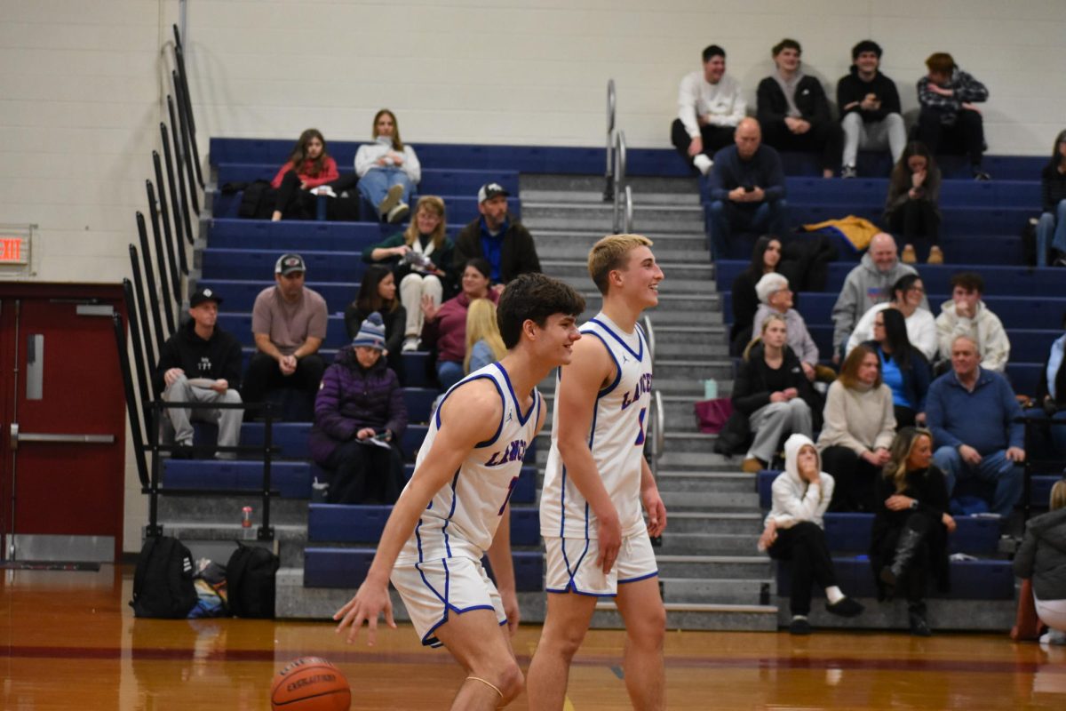 Senior players Mason Paquette and Matt Luongo, making memories for their last high school season. 