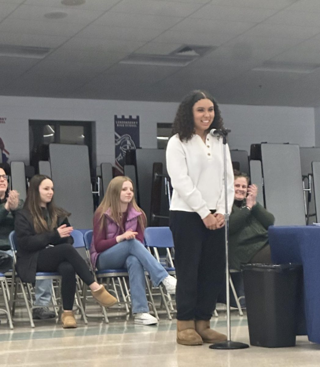 Senior Elizabeth "Lizzie" Sosa gets recognized during a school board meeting for winning New Hampshire Journalist of the Year. Sosa has now become only the second student from New Hampshire to be chosen for this honor, with the previous winner also being a Londonderry High School student, Kelly Egan, last year. At that school board meeting, Principal Rick Barnes said “we are exceedingly proud of Lizzie and wish her the best as she enters the next round of the competition.” 